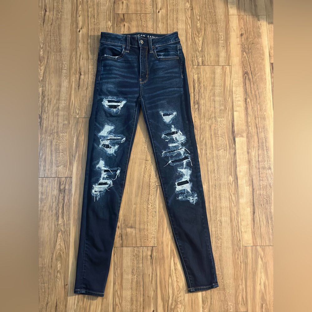 Distressed American Eagle jeans.